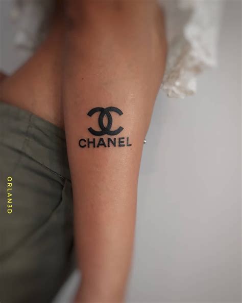 chanel finger tattoo|Chanel tattoo.